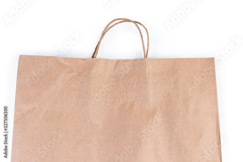 Paper bag upper part with rope handles on white background