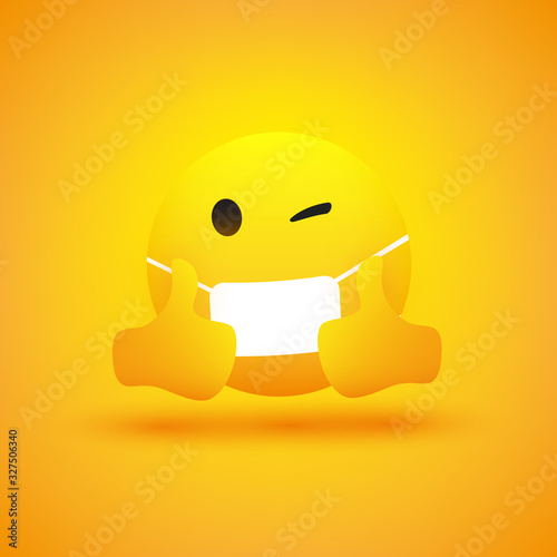 Emoji - Simple Emoticon with Winking Eye, Showing Thumbs Up and Wearing Medical Mask - Vector Design on Yellow Background