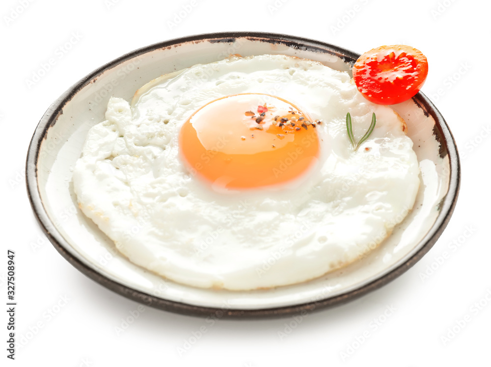 Plate with fried egg on white background Plate with fried egg on white background