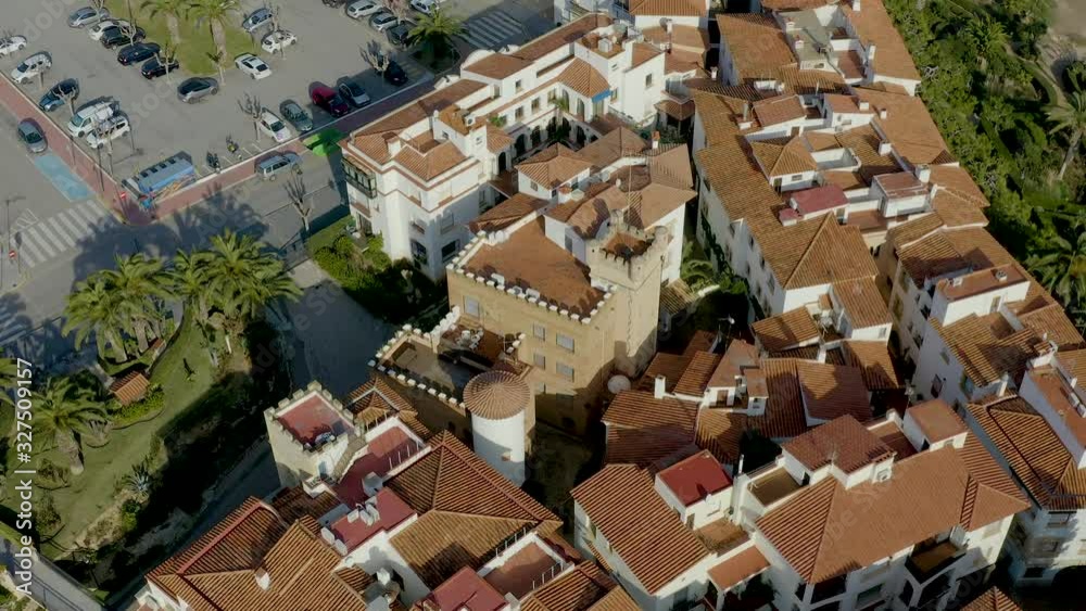 Aerial view over coastal town in mediterranean sea in winter. Roc de Sant Gaieta, Tarragona province in Catalonia, Spain Aerial view over coastal town in mediterranean sea in winter. Roc de Sant Gaieta, Tarragona province in Catalonia, Spain
