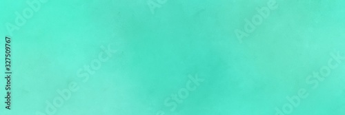 abstract painting background texture with medium turquoise, aqua marine and light sea green colors and space for text or image. can be used as horizontal background texture