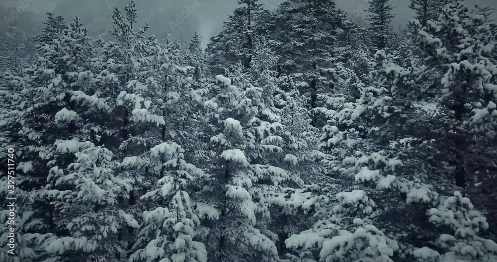 FLYING THROUGH PEAKS OF SNOWY MOUNTAINS 4K FLYING THROUGH PEAKS OF SNOWY MOUNTAINS 4K