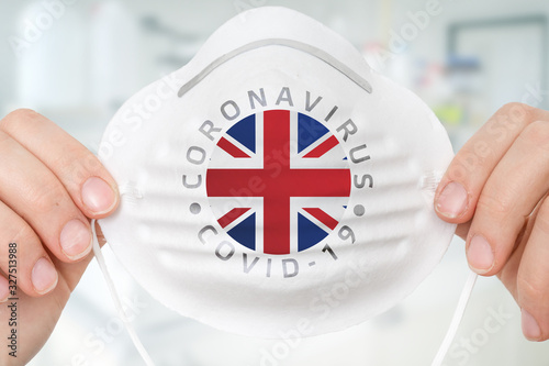 Respirator mask with flag of United Kingdom - Coronavirus COVID-19 concept