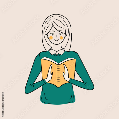 Girl studying with some books. Young student girl. Education and learning concept