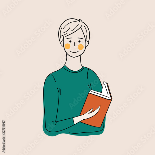 Boy studying with some books. Young student boy. Education and learning concept