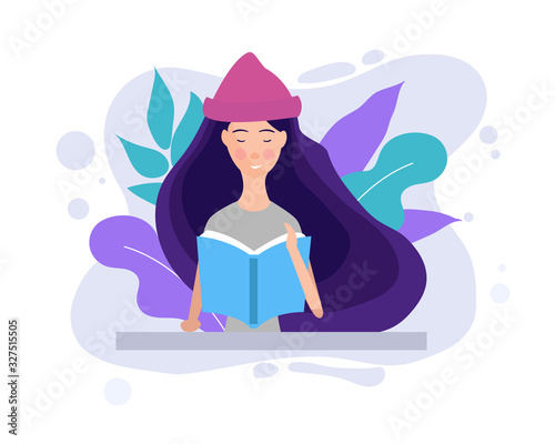 Girl studying with some books. Young student girl. Education and learning concept