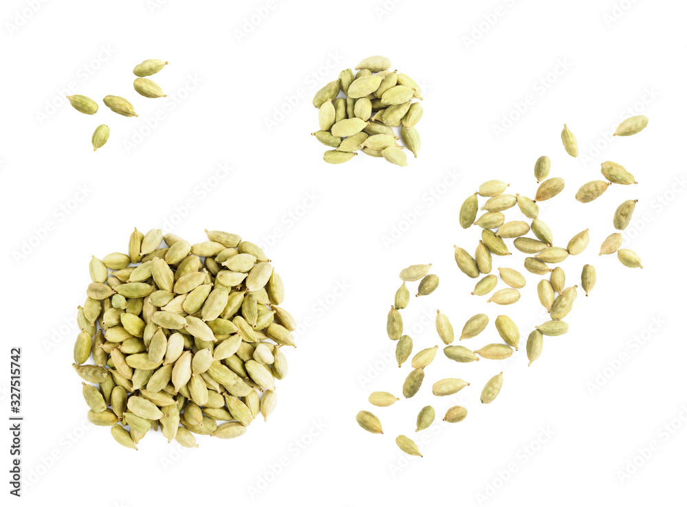 Set of spice green cardamom isolated on white background in bunch Set of spice green cardamom isolated on white background in bunch