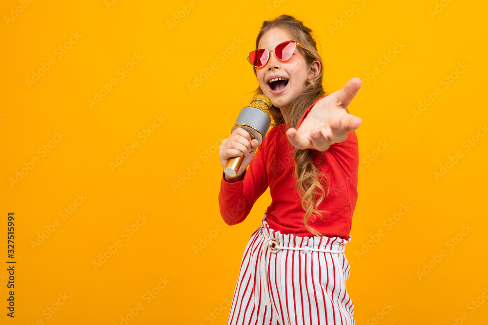 presenter with a microphone on a yellow background presenter with a microphone on a yellow background
