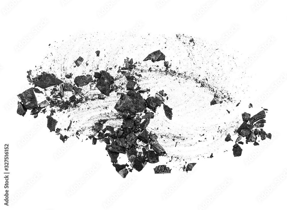 Black coal dust with fragments isolated on a white background, top view. Black coal dust with fragments isolated on a white background, top view.