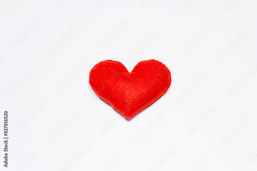 Red felt heart isolated on white background. Valentines Day or Wedding romantic concept