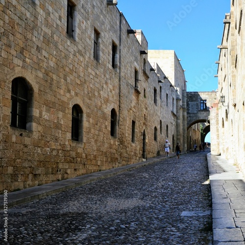 Fototapeta Naklejka Na Ścianę i Meble -  Rhodes, Greece. Ippoton Street (Knights Street) in Rhodes, Greece. Narrow street of medieval Old Town of Rhodes town. UNESCO World Heritage
