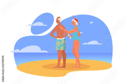 Happy and active seniors spending time on the beach together