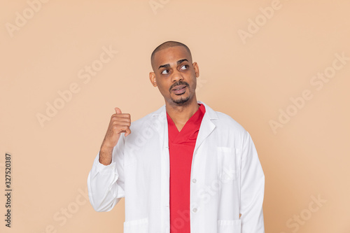 African doctor wearing red uniform © Gelpi