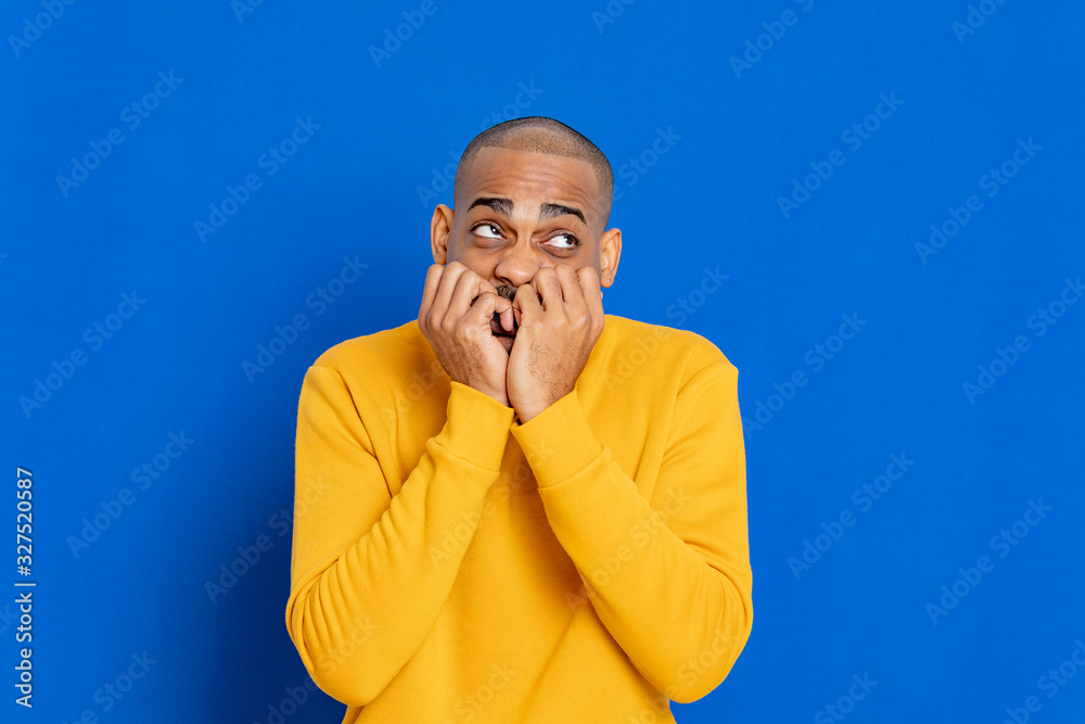 African guy with a yellow jersey African guy with a yellow jersey