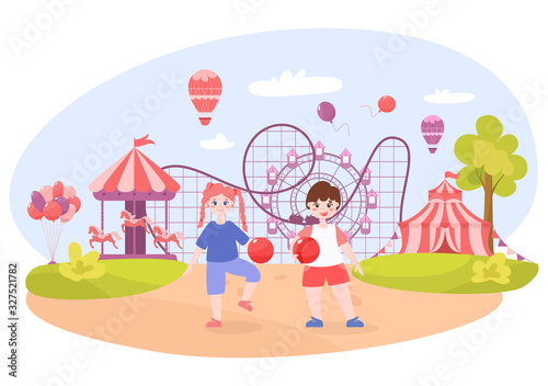 Happy toddler in amusement park. Baby boy with balloons and girl in