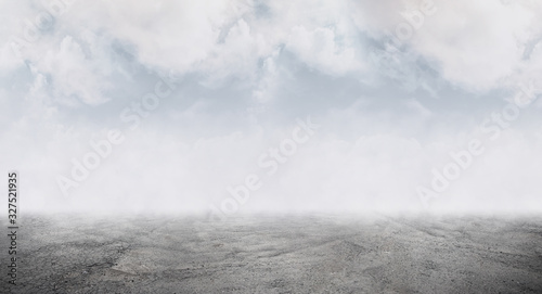 Fotografie Background with old concrete floor disappearing in the mist.