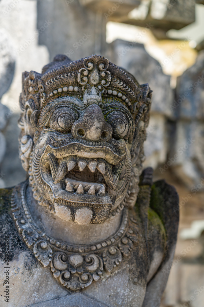 Ancient Balinese statue at the temple Ancient Balinese statue at the temple