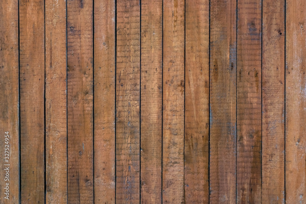 Rustic wooden fence with vertical planks, brown background - obrazy, fototapety, plakaty 