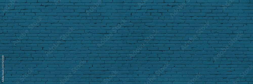 Obraz premium Panoramic Long And Wide Wall of Blue or Teal Bricks. Teal Wide Banner for Web With Textured Blue Surface. Luxury Facade or Face Wall in Trend Color.