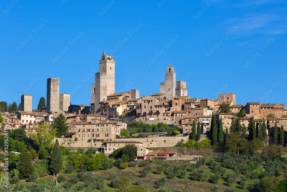 Beautiful view of the medieval town of San Gimignano in sunny day, Tuscany, Italy