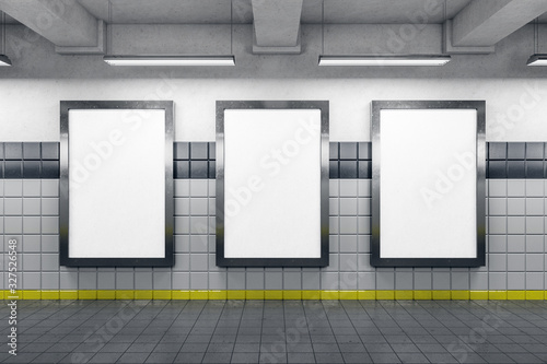 Subway station with three blank poster