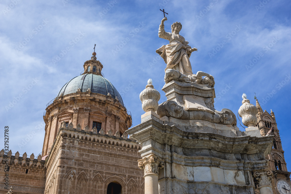Sculpture of St Rosalia and dome of Roman Catholic Assumption Cathedral in Palermo, Sicily Island in Italy