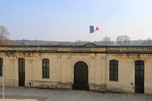 French flag on old building