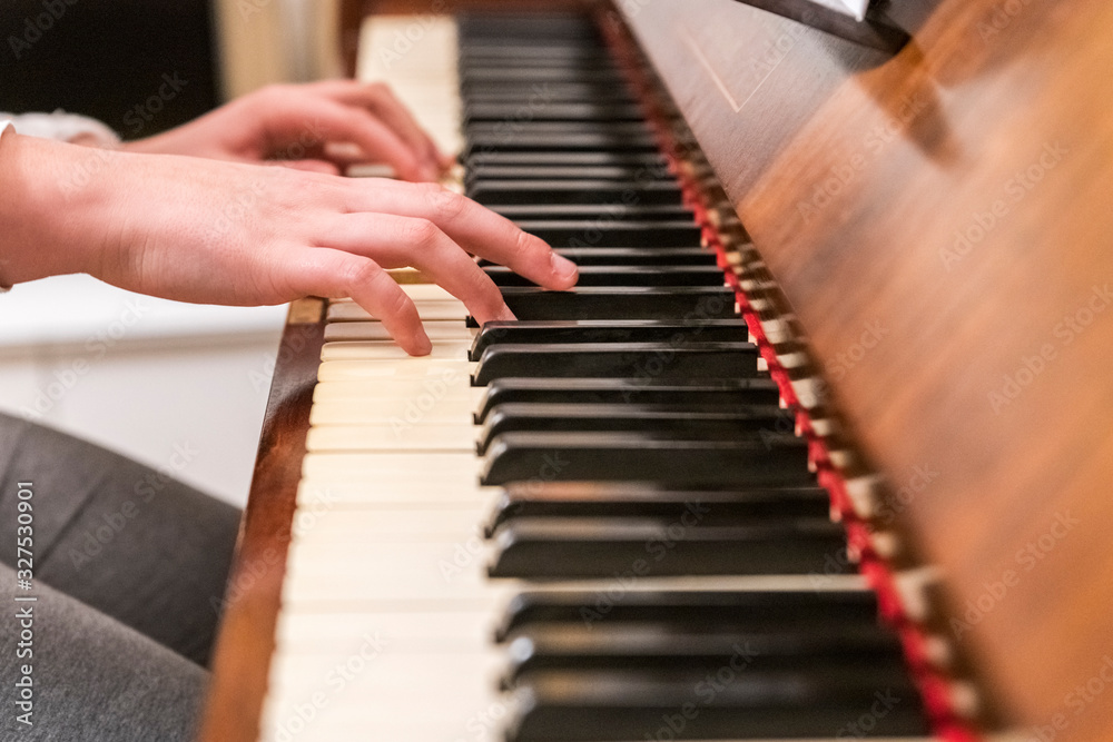 Fototapeta premium Hands on the piano. Magic music