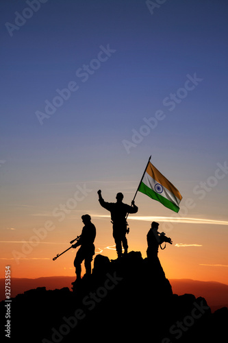 Canvas Print Three armed soldiers with the Indian flag