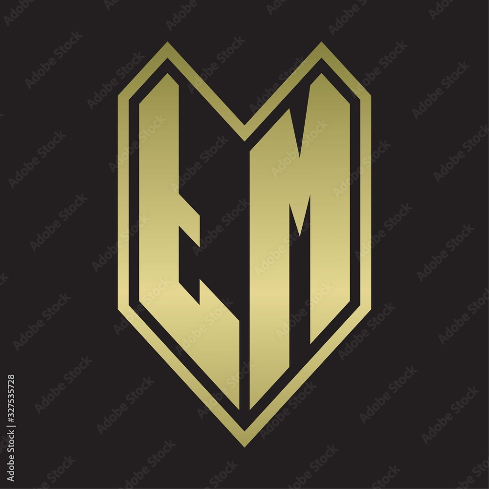 TM Logo monogram with emblem line style isolated on gold colors TM Logo monogram with emblem line style isolated on gold colors