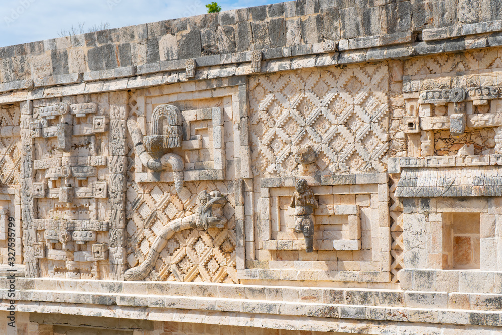 Fragment of the Governor's Palace (Nunnery Quadrangle). Uxmal an ancient Maya city of the classical period. Travel photo. Yucatan. Mexico. Fragment of the Governor's Palace (Nunnery Quadrangle). Uxmal an ancient Maya city of the classical period. Travel photo. Yucatan. Mexico.