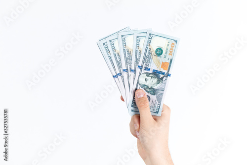 man holding dollars in his hand