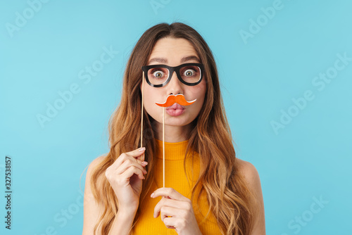 Canvas Print Portrait of joyous caucasian woman wearing paper eyeglasses and mustache