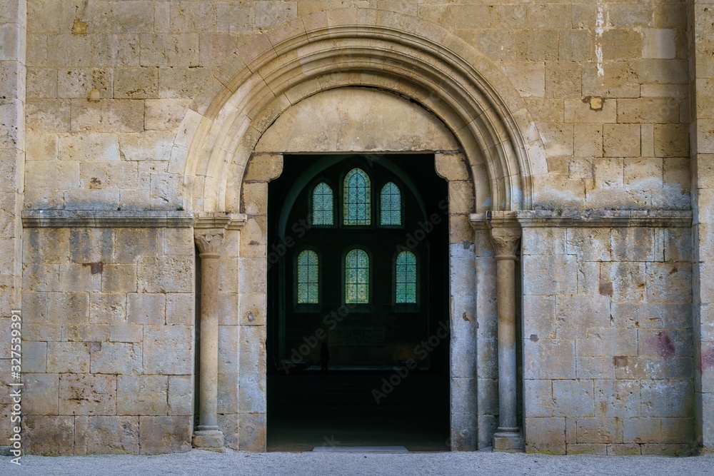 Ancient building of medieval French abbey with huge ceiling and windows. Abbey of Fontenay, Burgundy, France, Europe