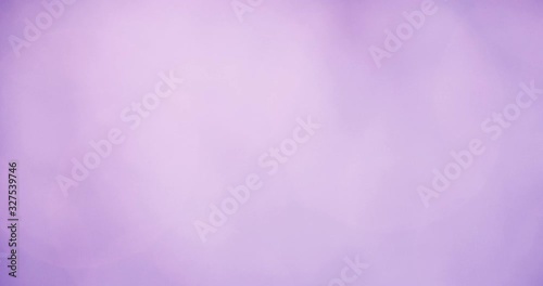 Slowly moving lilac gentle lights, defocused light reflections bokeh background