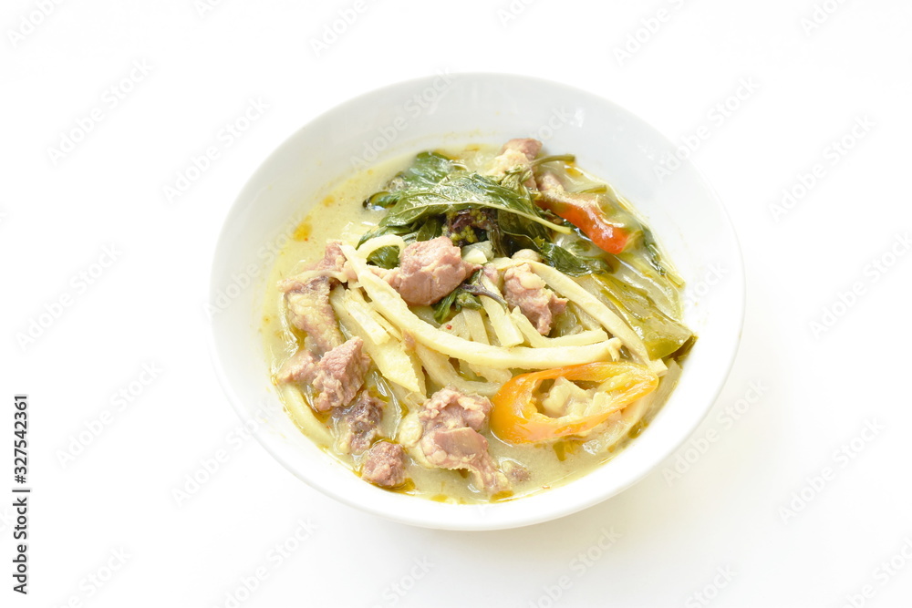 spicy boiled slice bamboo shoot with pork in coconut milk green curry soup on bowl spicy boiled slice bamboo shoot with pork in coconut milk green curry soup on bowl