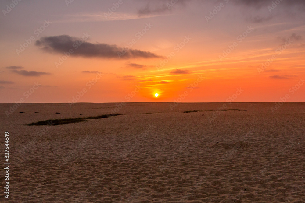 Sunset at the beach in Santo Andre, Portugal
