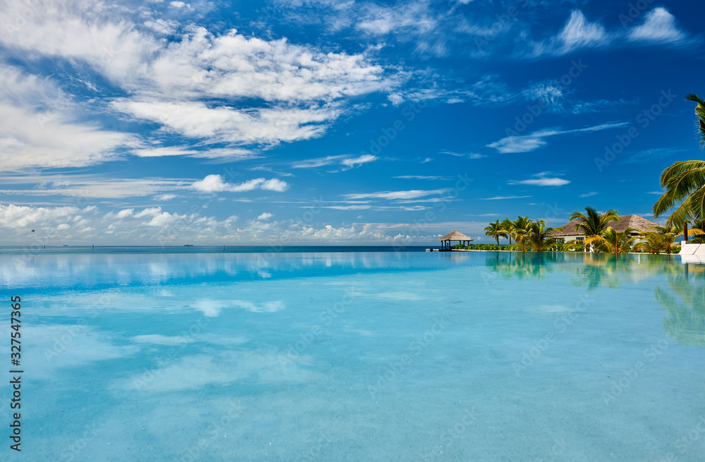 Fototapeta premium Luxury tropical infinity swimming pool