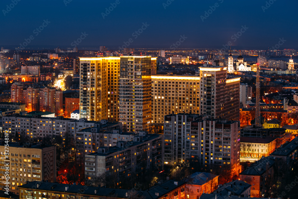 Fototapeta premium Night Voronezh aerial cityscape from rooftop. Residential area
