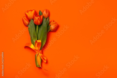 Print op canvas Bouquet of tulips in orange and rich red colors