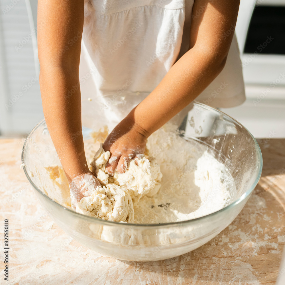 Cute little hands preparing dough. Cute little hands preparing dough.