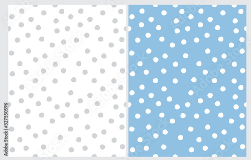 Abstract Hand Drawn Dotted Seamless Vector Patterns. WhiteDots Isolated on a Light Blue Background. Light Gray Polka Dots on a White Layout. Simple Geometric Irrgeular Vector Prints.