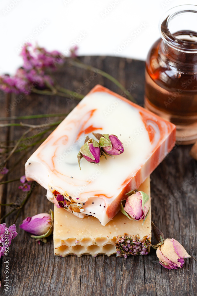 Concept of spa tretament and body care at home. Handmade bars of soap with natural organic ingredients: rose, honey. Detor, relax, anti-stress procedure. Atmosphere of serenity and pleasure