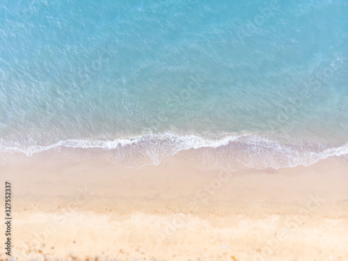 Blue sea and white sand beach in summer landscape for web advertisment and poster background.Aerial view of seashore coastline by drone