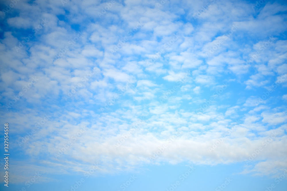 Feather clouds on the sky, background, copy space for text Feather clouds on the sky, background, copy space for text
