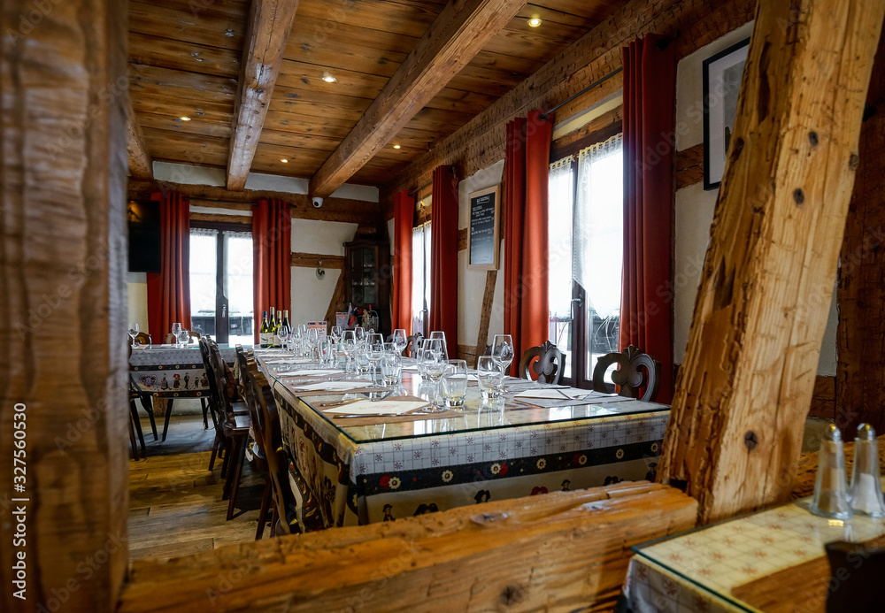 A traditional Alsatian restaurant with home cooking. Half-timbered house interior.