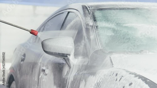 Slow Motion Video of a Car Washing Process on a Self-Service Car Wash