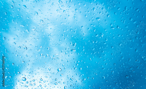 water drops background with blue filter