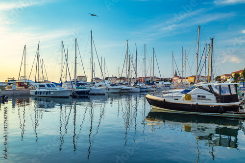 Harbor with docked boats in Porec town on Adriatic sea in Croatia, Europe. © Viliam