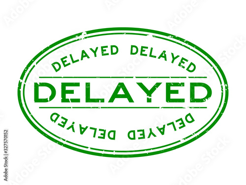 Grunge green delayed word oval rubber seal stamp on white background
